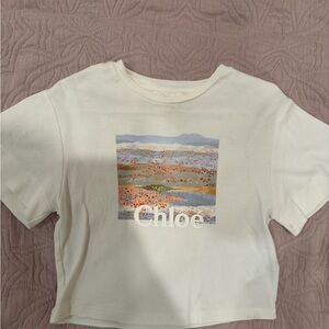 Chloe White Graphic Crop Tee with Pastel Landscape Print